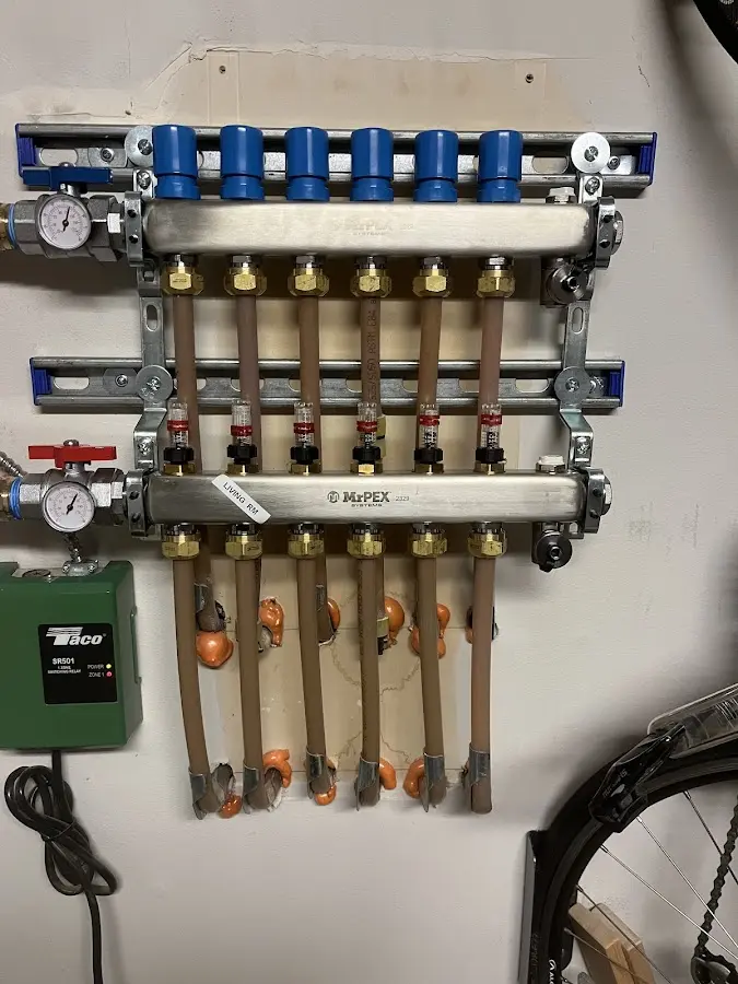 Plumber performing Gas Line Installation at a residential property in Madison